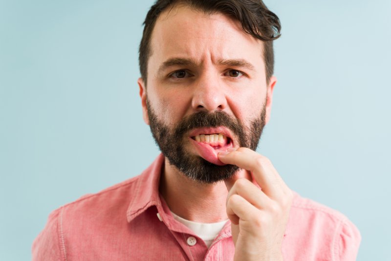 Man thinking about gum disease myths in Frisco